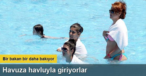 Antalya'da yakıcı güneşe ıslak havlulu çözüm
