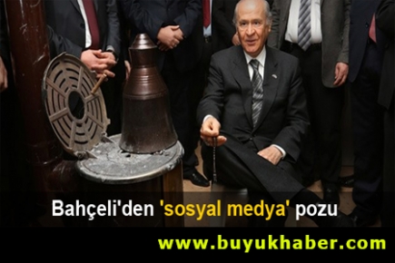 Bahçeli'den soba başında tesbihli poz