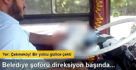 Belediye şoförü direksiyon başında kitap okudu