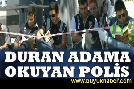 Duran adama okuyan polis