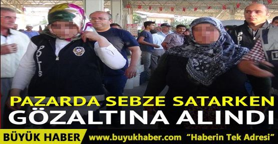 Pazarda sebze satarken gözaltına alındı