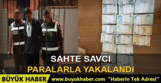 Sahte savcı paralarla yakalandı