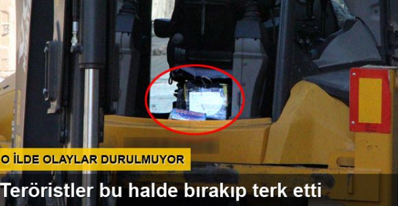 Teröristlerin çaldığı kepçeye şüpheli paket bırakıp terk etti